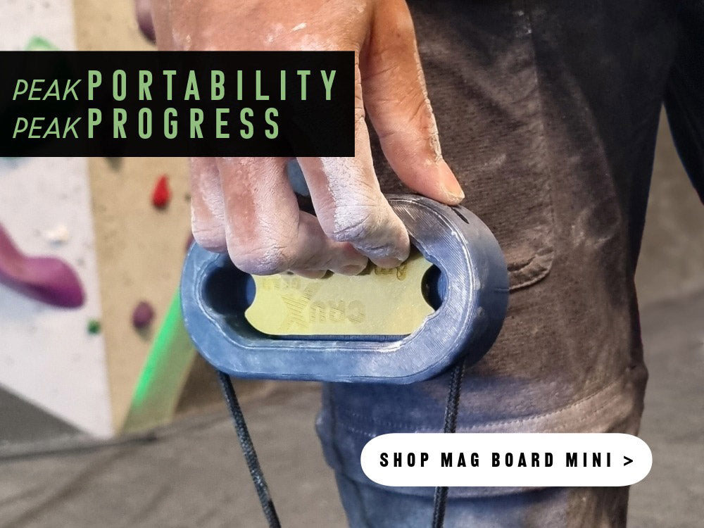 Person strengthening their grip strength for climbing and bouldering with Crux Gear Mag Board Mini.