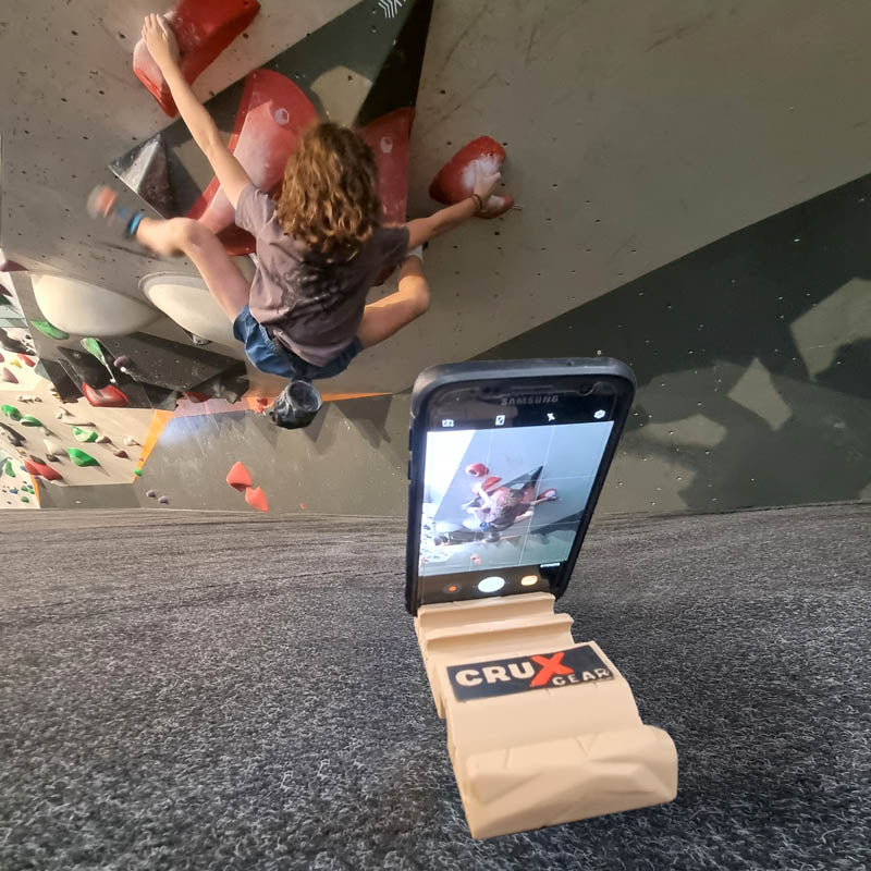 Crux Gear Phone Stone holding a camera for bouldering